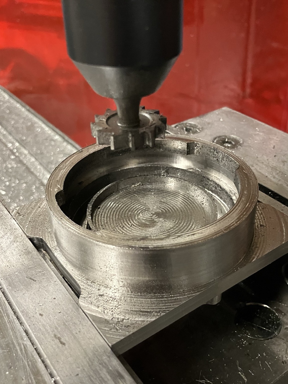 Milling the helical relief that holds the portafilter.