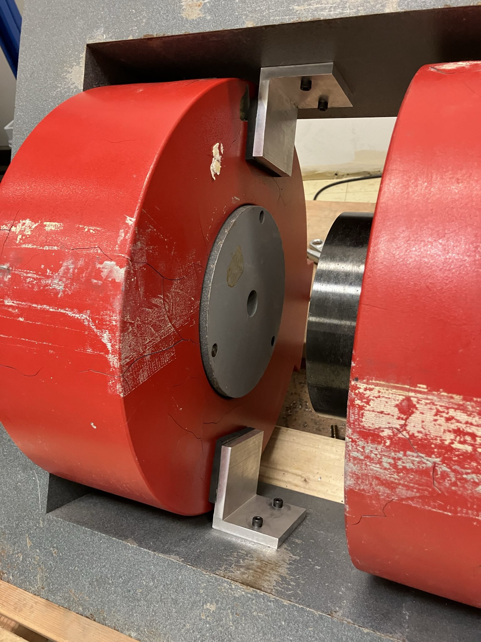 The brackets installed and supporting one coil.