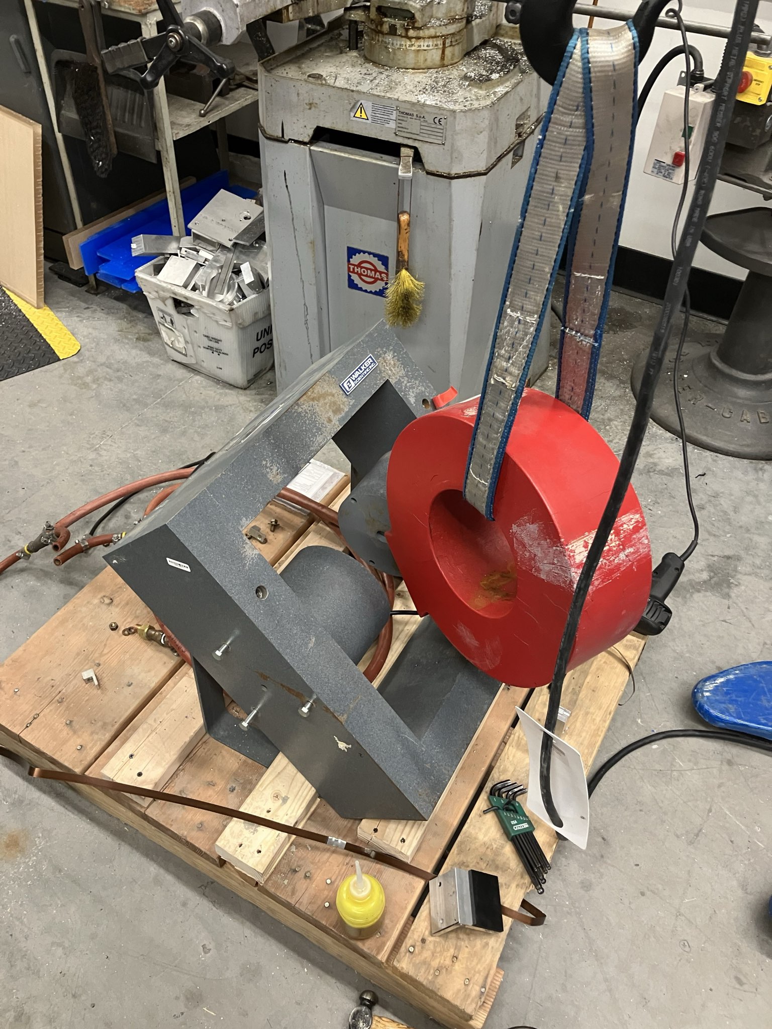 One coil being removed with a crane.