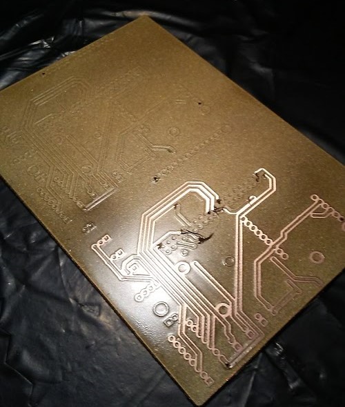 peeling the vinyl off the painted PCB