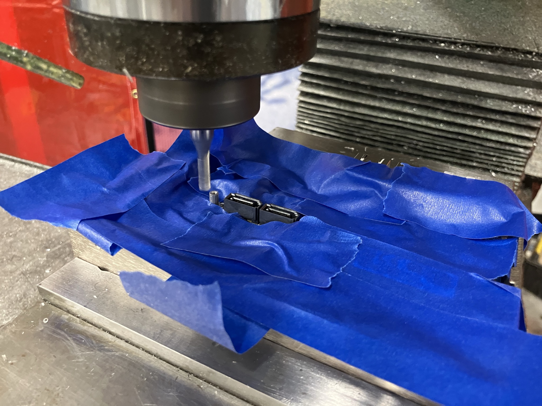 the WAFER board clamped in the vise of a milling machine