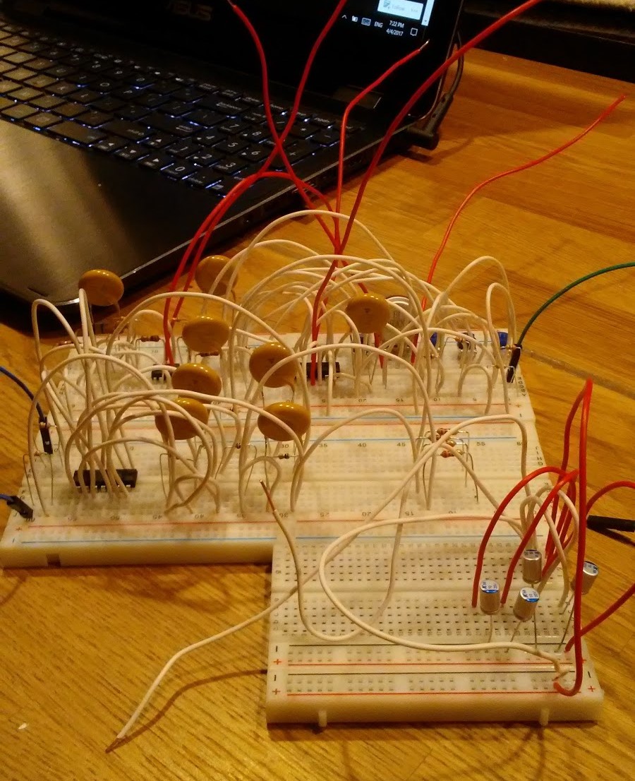 a messy breadboard with the STM electronics